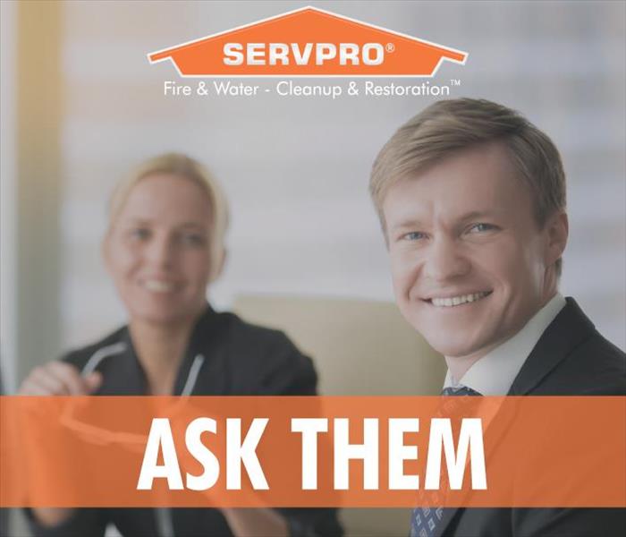 A businessman and a businesswoman smiling, Servpro logo, the phrase Ask Them 